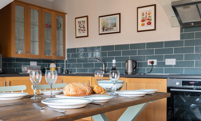 Tableware in kitchen of five star Snowdonia holiday cottage